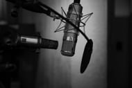 Merlino launched a weekly sports betting podcast in 2023 (Image via Unsplash)